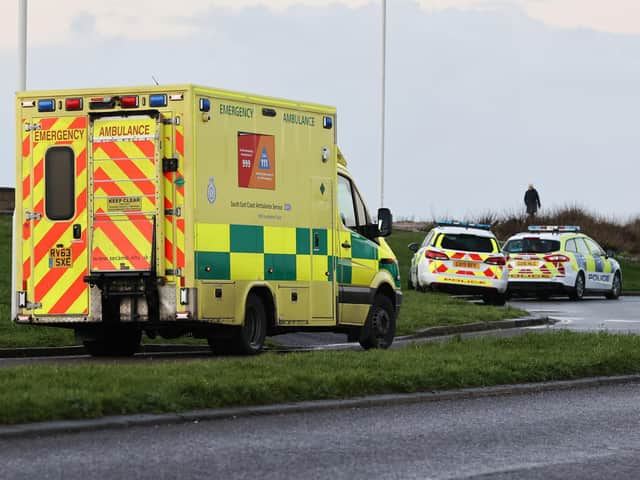 An ambulance crew joined police at the scene