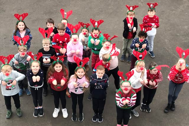 Children from Orchards Junior School completed their Reindeer Run dressed in Christmas clothes and red antlers