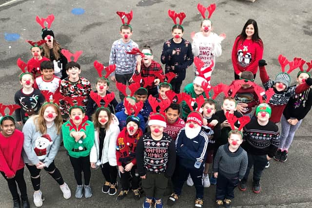 Children from Orchards Junior School completed their Reindeer Run dressed in Christmas clothes and red antlers