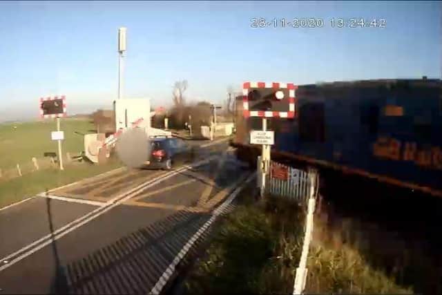 Driver’s near miss with train at level crossing near Rye