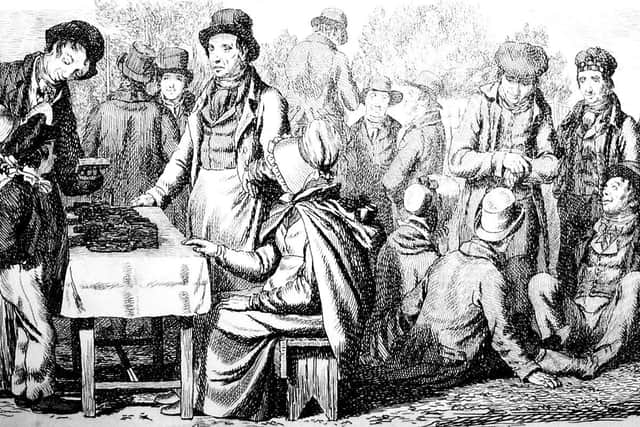 Gingerbread stand at the fair, 1833, an etching by Scottish artist Walter Geikie