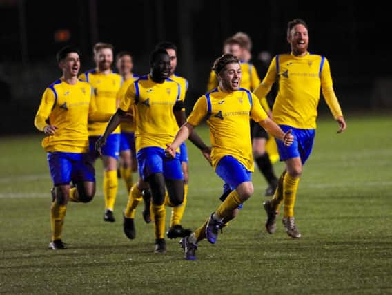 Lancing celebrate their shootout victory / Picture: Stephen Goodger
