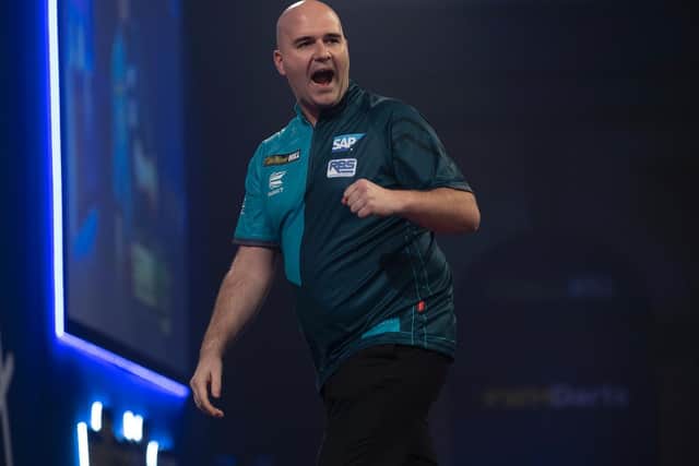 Rob Cross celebrates a throw against Dirk van Duijvenbode / Picture: Lawrence Lustig - PDC