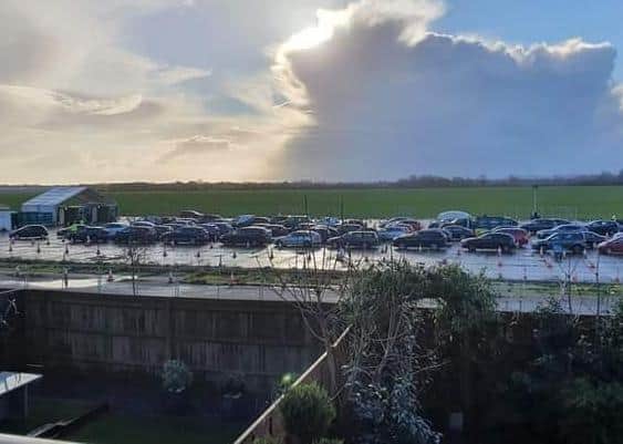 Hundreds of cars were said to be queuing up at the Tangmere Airfield testing facility on Sunday. Photo: Katie Gilbert  SUS-201222-153504001