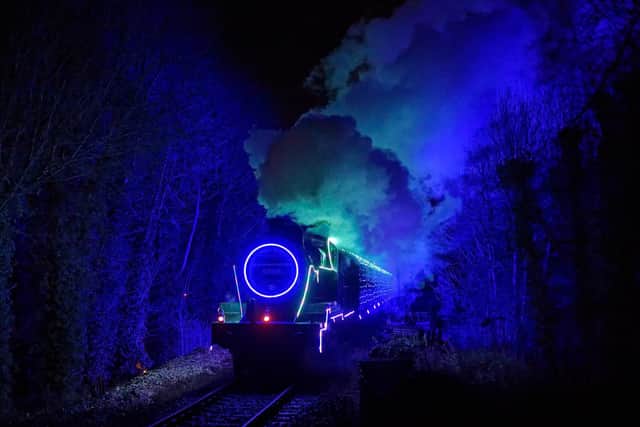 The light show, on and in two steam trains, consisted of more than 13,000 fully controllable colour mixing LED lights and LED wristbands. Photo: Stephen Morley