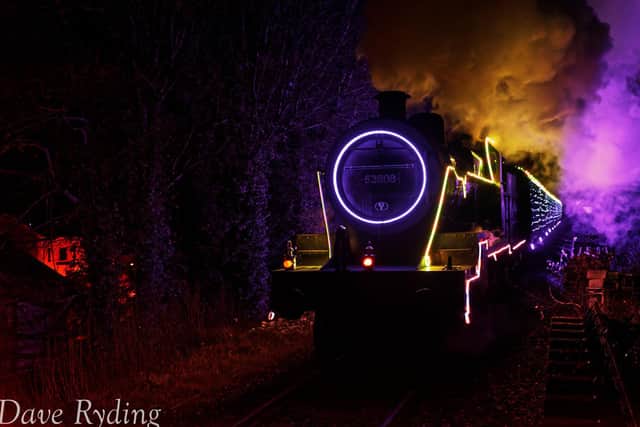 The light show, on and in two steam trains, consisted of more than 13,000 fully controllable colour mixing LED lights and LED wristbands. Photo: Dave Ryding