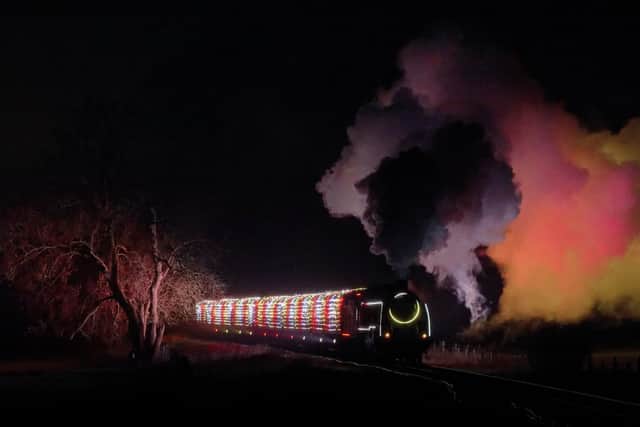 The light show, on and in two steam trains, consisted of more than 13,000 fully controllable colour mixing LED lights and LED wristbands. Photo: Stephen Morley