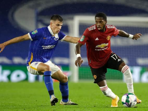 Jayson Molumby is action for Brighton against Man United in the Carabao Cup