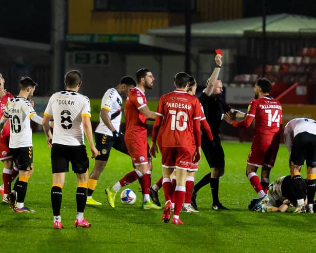 Tarryn Allarakhia is shown red against Newport County. Picture by UK Sports Images Ltd