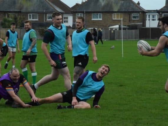Rugby players - like these at Bognor - hope to be back in action properly in 2021