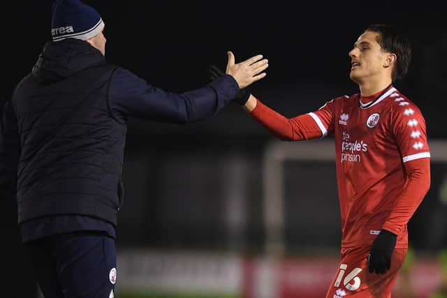 Tom Nichols celebrates with assistant head coach Lee Bradbury