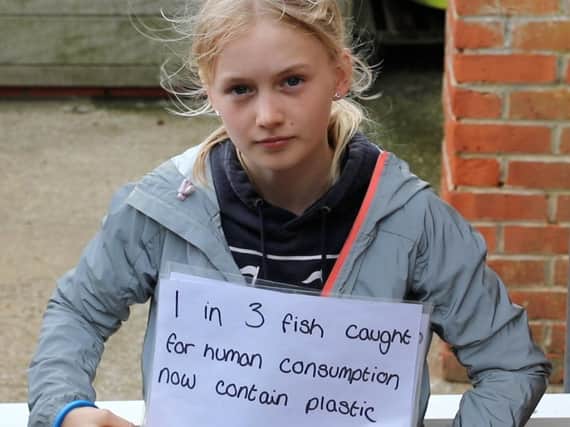 A young Emsworth SC member with an environmental message