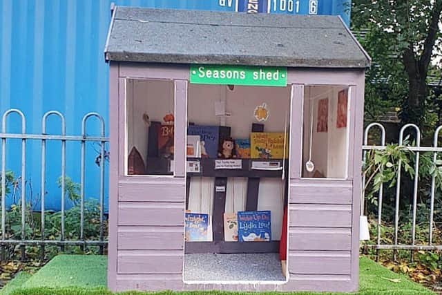 The finished Seasons Shed, filled with themed activities to inspire conversation