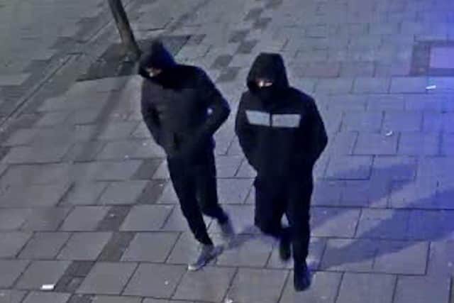 Police have released this image of two suspects involved in robberies in Worthing SUS-210501-181237001