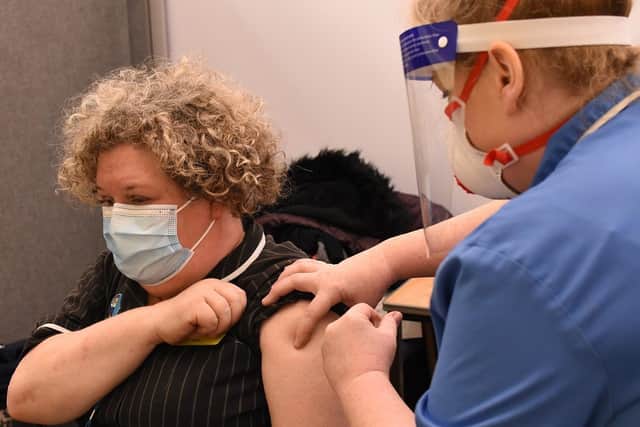 Dee Daly receiving her vaccination SUS-210601-122232001