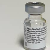 A vial for the first available Covid-19 immunisation, Pfizer-BioNTech’s mRNA vaccine