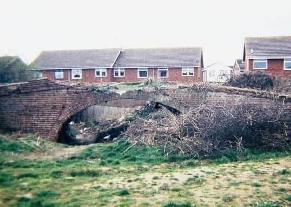 The bridge before it became overgrown. Photo by Yapton History Society