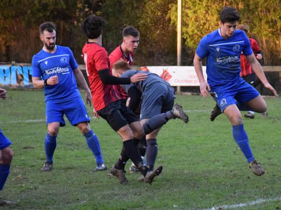 AFC Uckfield in recent action against Broadbridge Heath / Picture: Mike Skinner