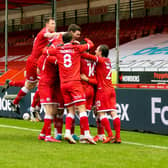 Crawley players celebrate Nick Tsaroulla's goal. Picture: UK Sports Images Ltd