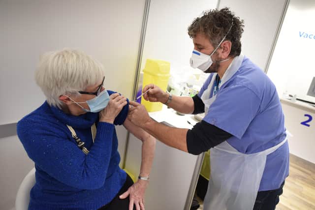 Victoria Medical Centre (VMC) Vaccination Clinic inside The Beacon shopping centre in Eastbourne.

Professor Keith Stone vaccinating Lee Buckland. SUS-210901-143445001