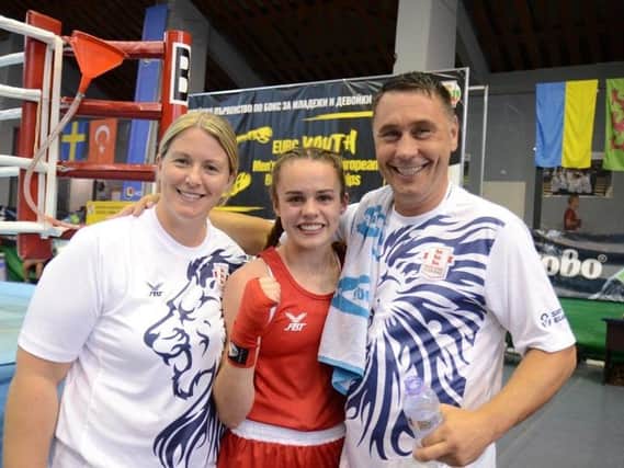 Holly Heffron with England coaches Amanda Coulson and Mike Driscoll