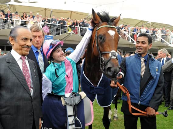 Prince Khalid Abdullah, far left, looks a picture of pride after Frankel's win in the 2011 Sussex Stakes / Picture: Malcolm Wells