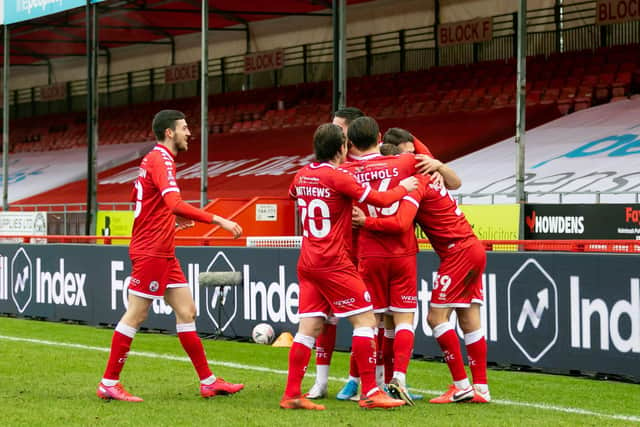 Crawley Town players celebrate with goalscorer Nick Tsaroulla against Leeds United. Picture by UK Sport Images Ltd