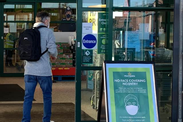 Morrisons supermarket chain said customers who refused to wear a mask without a medical exemption will be told to leave its stores. Photo by PAUL ELLIS/AFP via Getty Images
