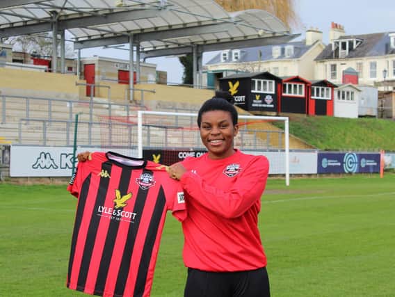 Ini Umotong shows off her new jersey / Picture: Lewes FC