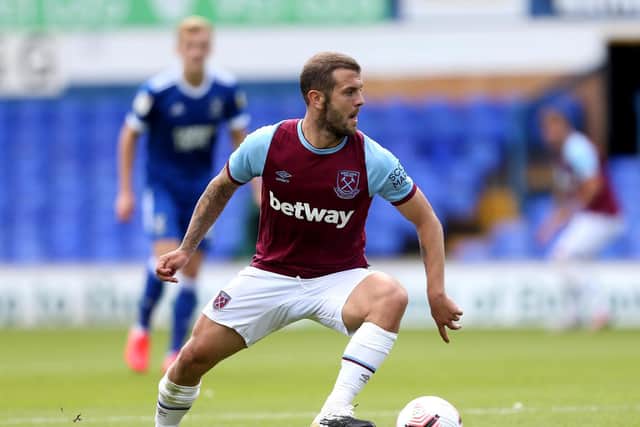 Jack Wilshere, pictured playing for West Ham, could be in action against the Reds on Saturday