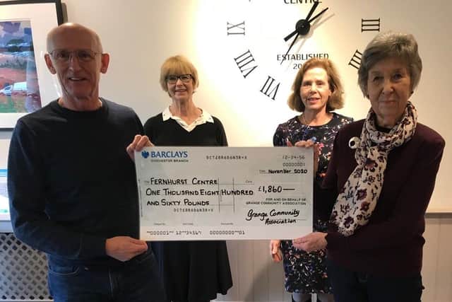 Grange Community Association trustees Joan Hursthouse and Mike Boyce present the cheque to the Fernhurst Centre