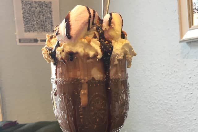 The Eye Café at Dixey CB Opticians won the champion hot chocolate competition with its 'ultimate chocolate mess' SUS-210120-101651001