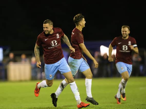 Hastings celebrate a goal at Haywards Heath ... the club are worried another season, albeit an unfinished, of hard work will be written off / Picture: Scott White