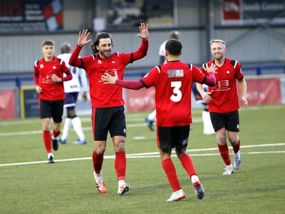 Eastbourne Borough celebrate a goal at Havant - but will that be their last league game of the season? Picture: Lydia Redman