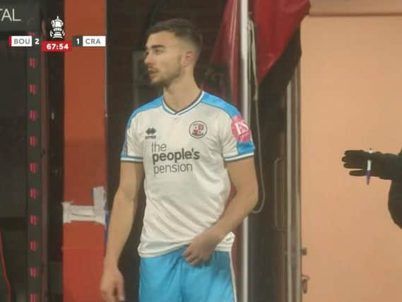 A screen grab from BT Sport as Davide Rodari prepares for his Crawley debut in the Cup at Bournemouth