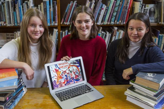 Emily Manders, Olivia Taggart and Megan Turtle created the beautifully-illustrated book Brighton to Bulgaria, An Adventure, with all proceeds going to Worthing charity Door of Hope. Picture: David McHugh