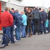 Crawley Town fans queue for tickets