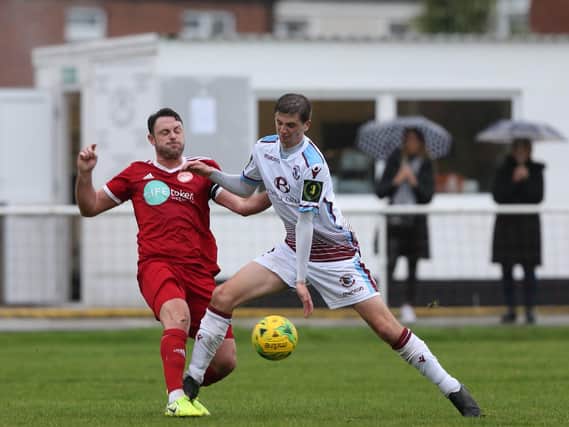Ollie Black in FA Trophy action for Hastings before the season was halted / Picture: Scott White