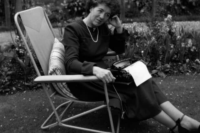 Children's writer Enid Blyton (1897 - 1968) sitting in her garden in Beaconsfield, Buckinghamshire. Photo by George Konig/Getty Images