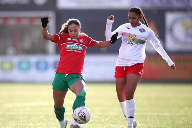 Lewes' Simran Jhamat tracks Ashlee Brown of Coventry / Picture: Getty