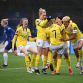 Brighton celebrate their surprise WSL victory at Chelsea yesterday