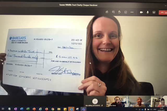 Louise Collins, corporate and community fundraising officer at Sussex Wildlife Trust, accepts the donation in a webinar