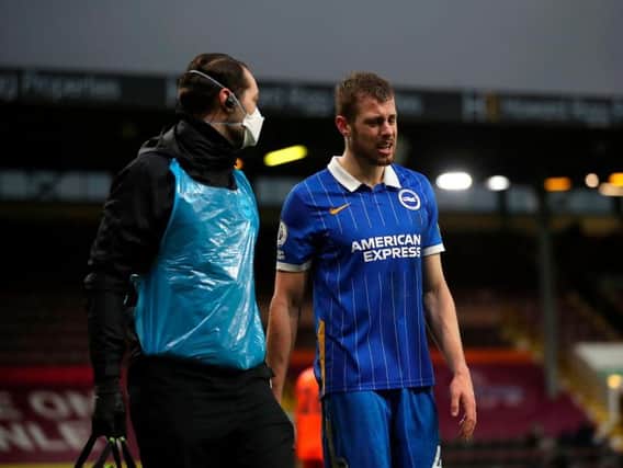 Adam Webster will miss Brighton's trip to Leicester in the FA Cup on Wednesday