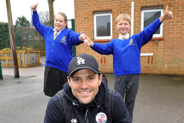 Mark Wright with two pupils. Pic Steve Robards