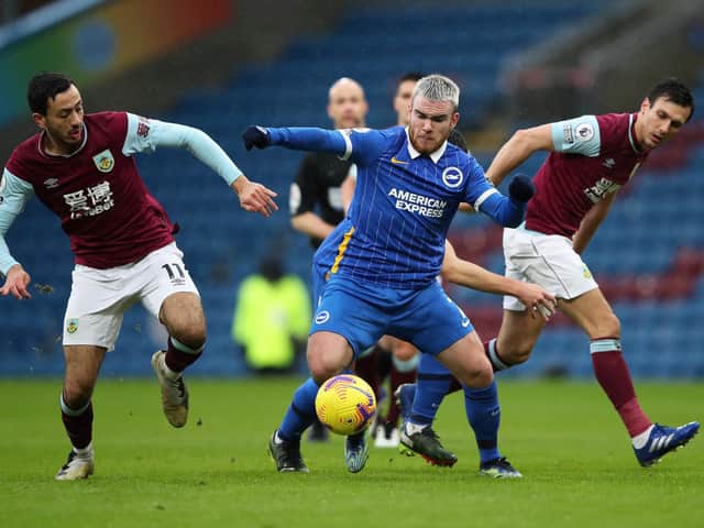 Aaron Connolly battles against Burnley