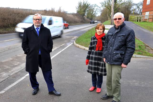 Jean and Barry Burks (right) are campaigning to have HGVs banned from Titnore Lane, a 40mph limit introduced and a road crossing put in. Pictured here with Sean McDonald, County and Borough Councillor. Pic Steve Robards SR2102151 SUS-210215-192229001