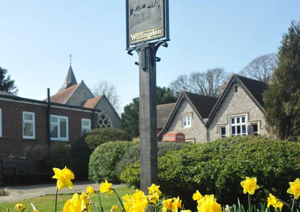 Spring flowers, daffodils, at Willingdon village March 29th 2012 E13213N ENGSUS00120120330110958