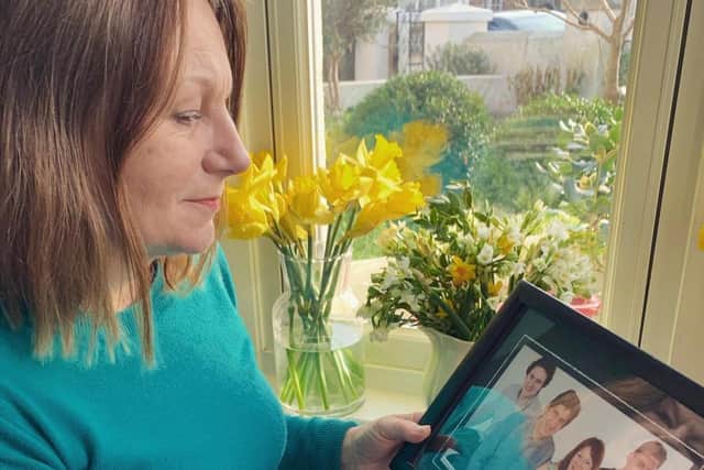 Olly's Future founder Ann Feloy with daffodils in her window in memory of her son, Oliver Hare