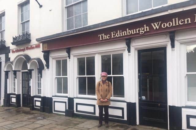 Debbie Carter outside The Edinburgh Woolen Mill store which closed late last year