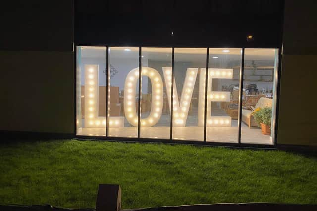 An illuminated message of hope became a sign of love at a gym in Selsey on Valentine's Day